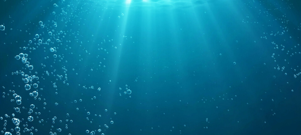 Underwater,Background,With,Water,Bubbles,And,Undersea,Light,Rays,Shine